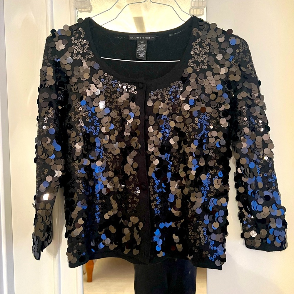 Black Sequined cardigan.